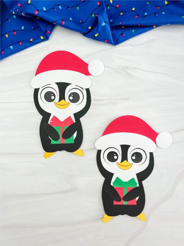 two examples of finished Christmas penguin craft
