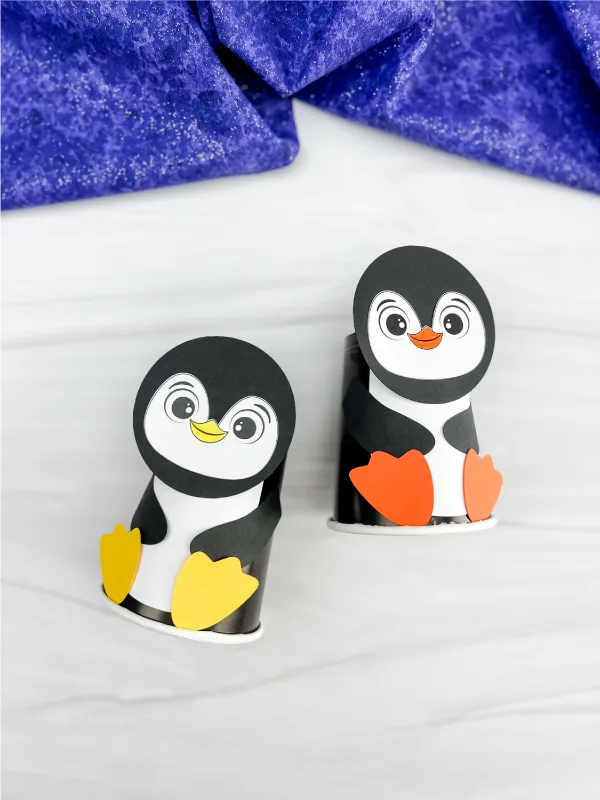 two side by side examples of penguin paper cup craft