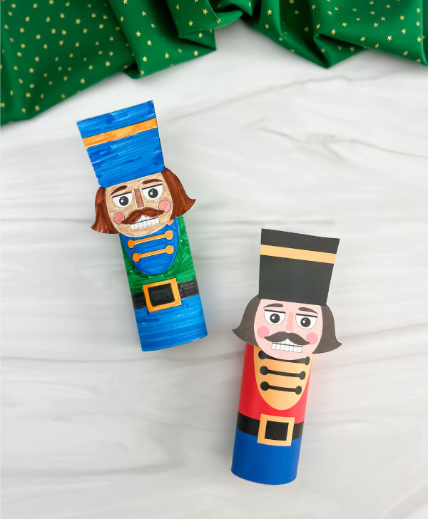 two finished nutcracker toilet paper roll crafts side by side