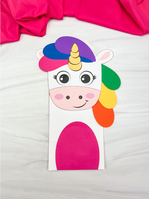 single finished example of unicorn rainbow puppet