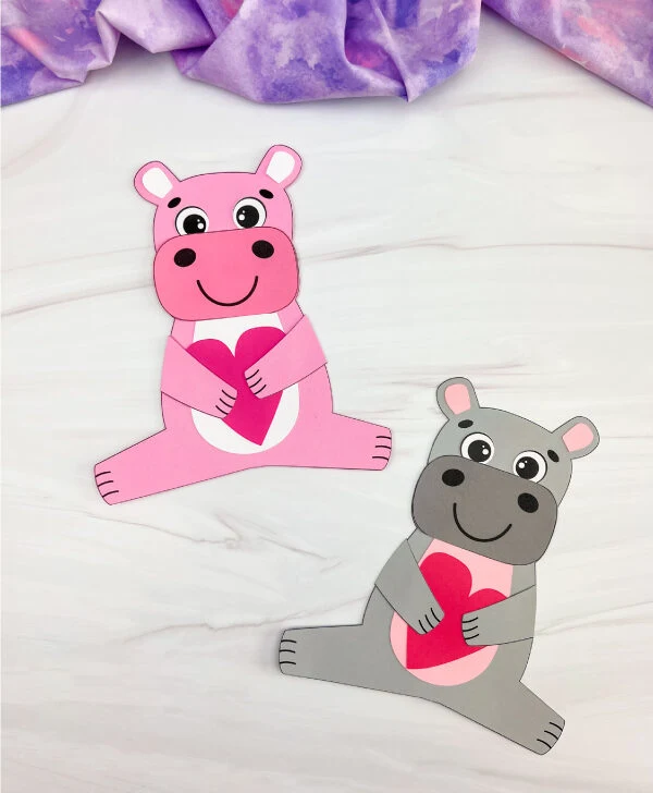 two examples of finished hippo valentine craft pink and gray