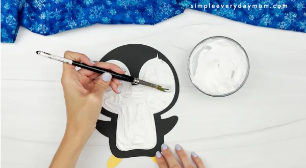 painting the top body of the penguin craft