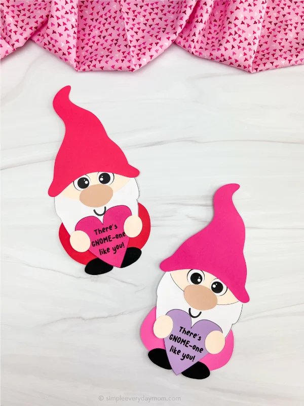 two examples side by side of finished gnome valentine craft