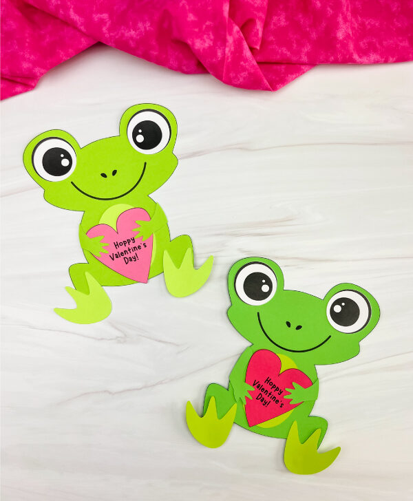 two side by side examples of finished frog valentine craft