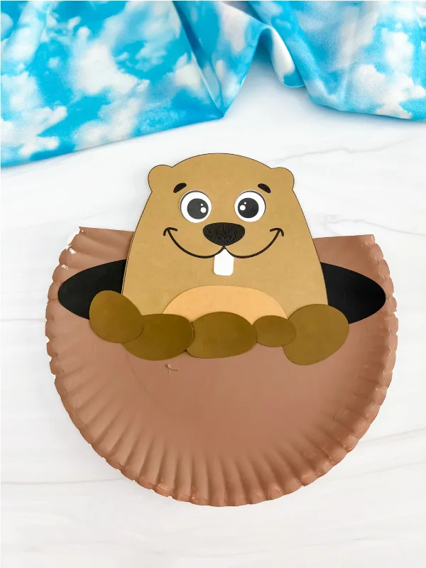 single example of finished groundhog paper plate craft