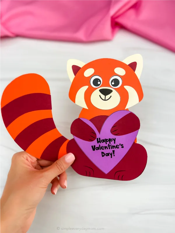hand holding single example of red panda valentine craft