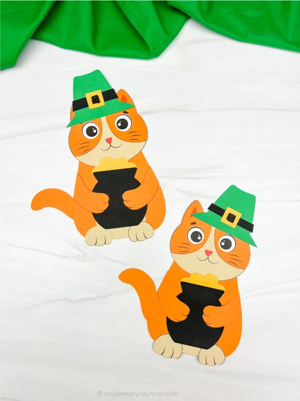 two finished cat leprechaun crafts