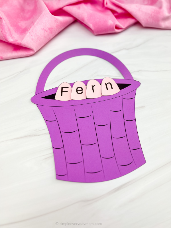 single example of finished Easter basket name craft in purple