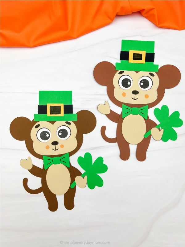 two examples of finished leprechaun monkey craft