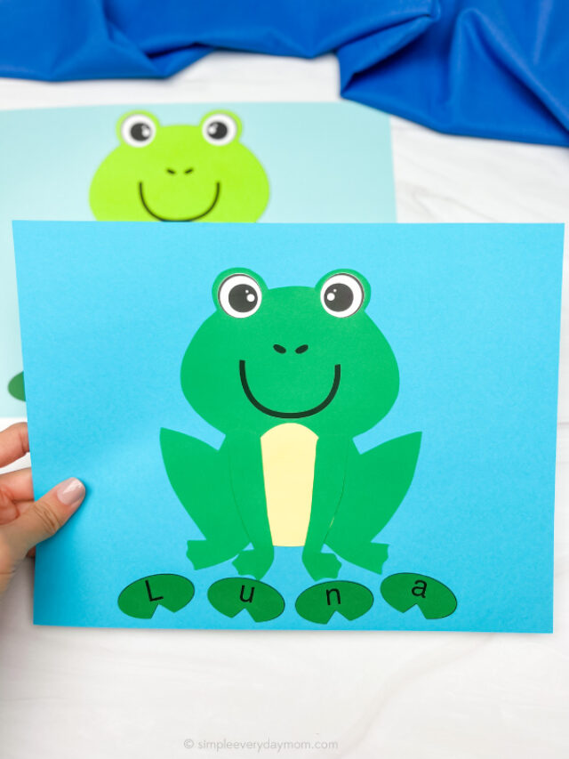 hand holding finished frog name craft with another one in background