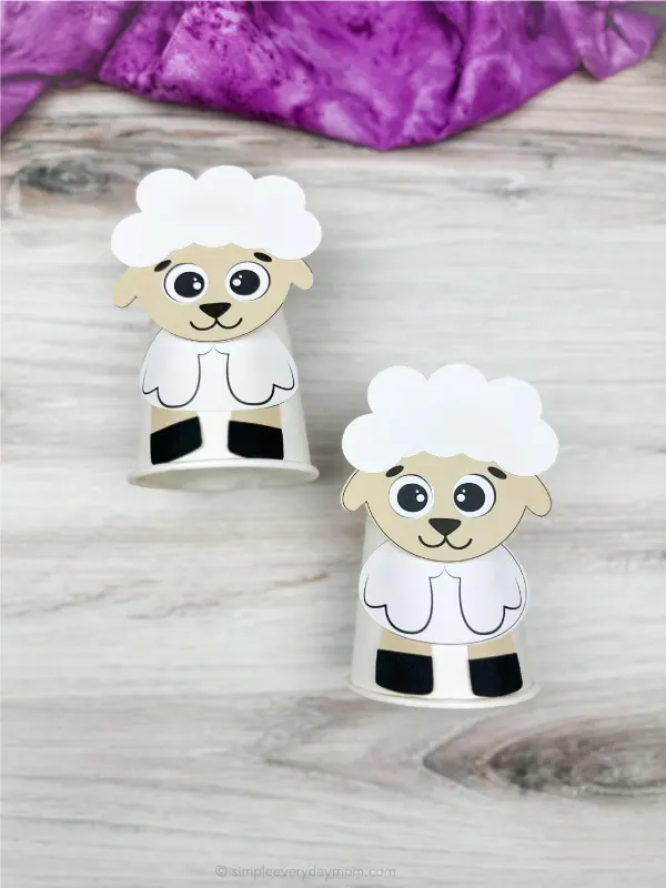 two side by side examples of finished sheep paper cup craft
