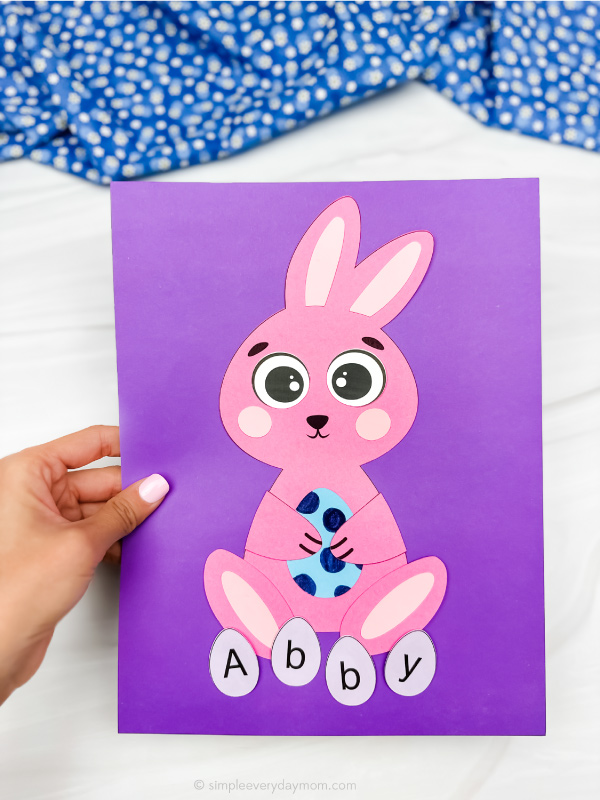 hand holding finished example of bunny name craft