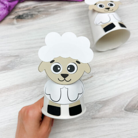 hand holding sheep paper cup craft with another in background