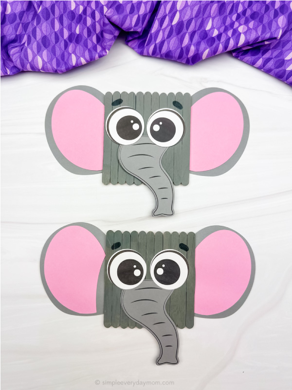 two examples of finished popsicle stick elephant craft