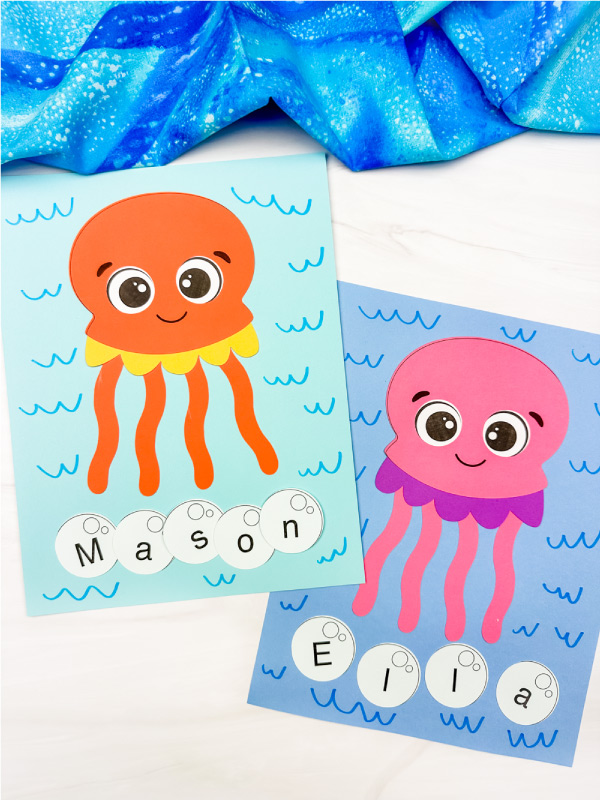 two side by side examples of finished jellyfish name craft