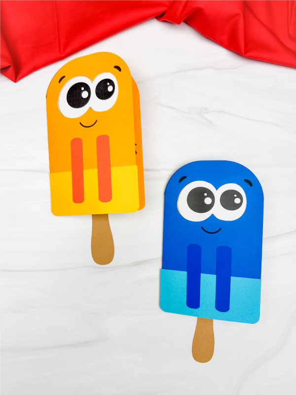 two examples of finished popsicle stick father's day craft