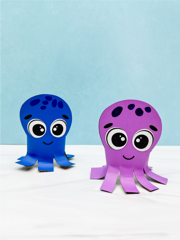 two side by side examples of finished octopus toilet paper roll craft