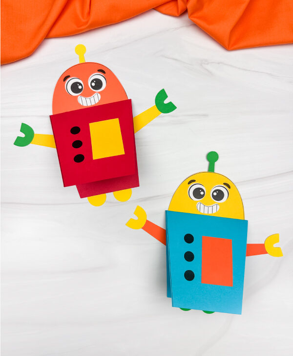 two side by side examples of finished robot card craft