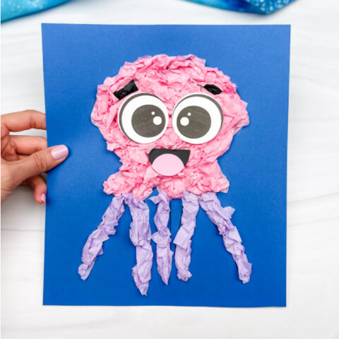 hand holding single image of tissue paper jellyfish