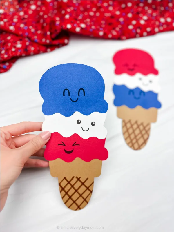 hand holding ice cream craft with another example in the background