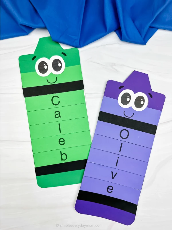 two side by side examples of finished crayon name craft