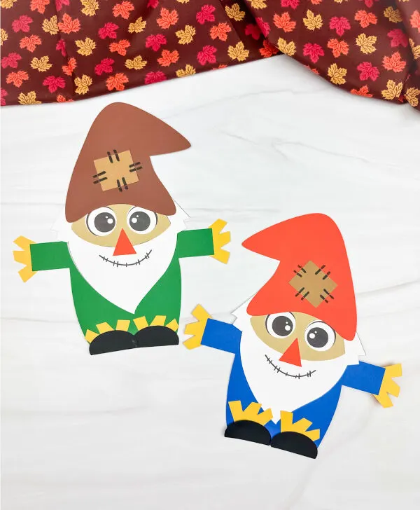 two examples of finished scarecrow gnome craft