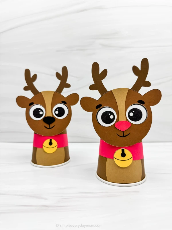 two side by side examples of finished reindeer paper cup craft