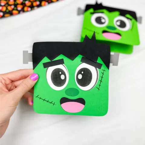 hand holding Frankenstein card craft with another example in the background