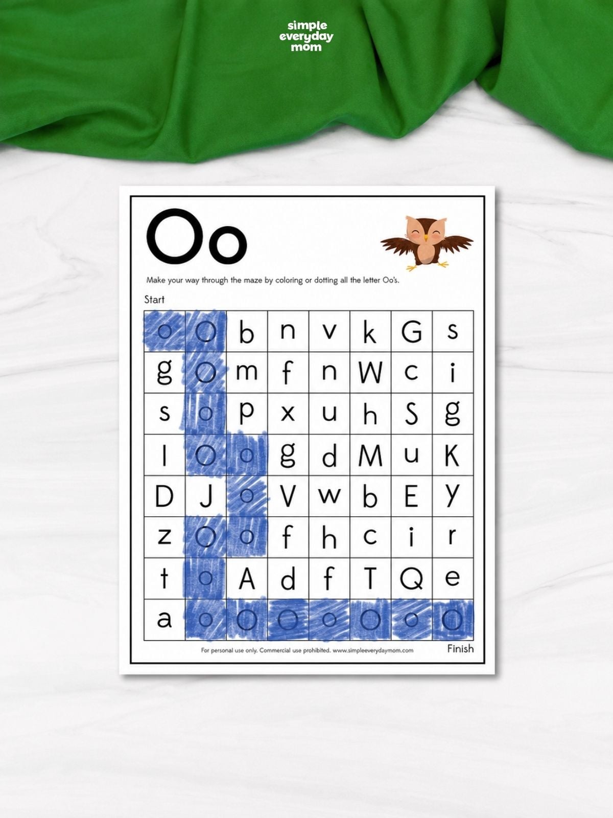 Letter O maze worksheet with a colored path through uppercase and lowercase O's.