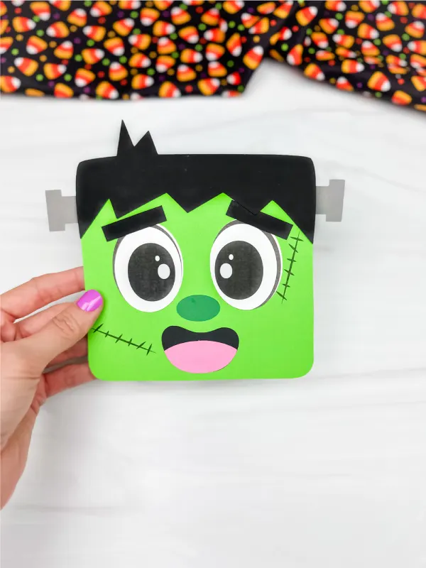 hand holding Frankenstein card craft