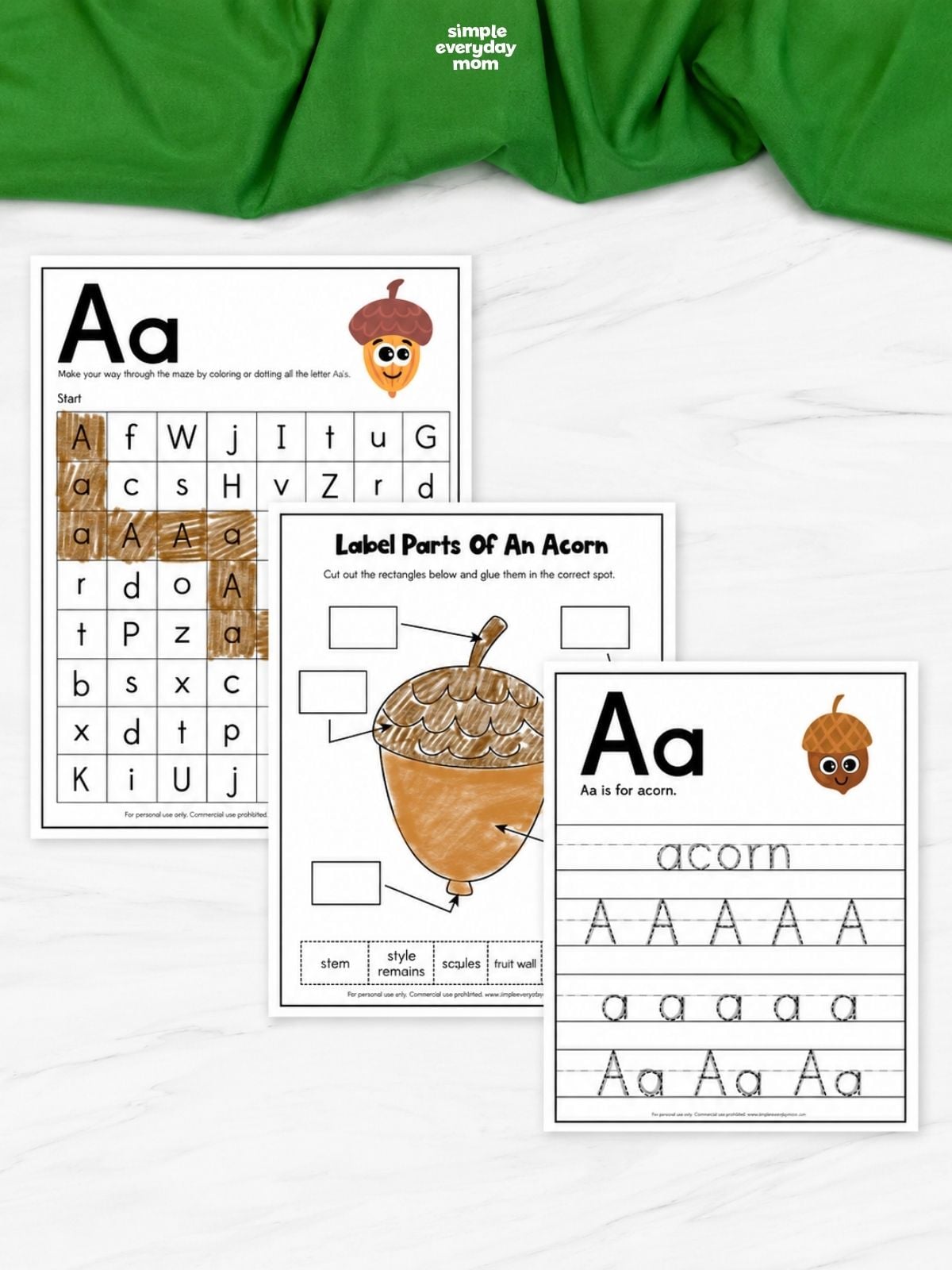 Three printable acorn-themed preschool worksheets arranged together: a letter A maze, an acorn-parts labeling activity, and a letter A tracing page.