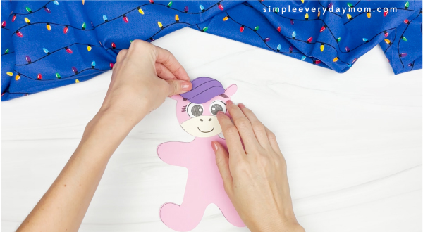 handgluing the unicorn's mane