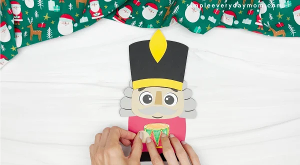 handgluing the hand of the nutcracker gnome craft