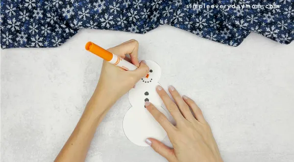 drawing a nose using marking on how to catch a snowman craft