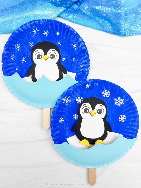 double image of moving penguin paper plate craft