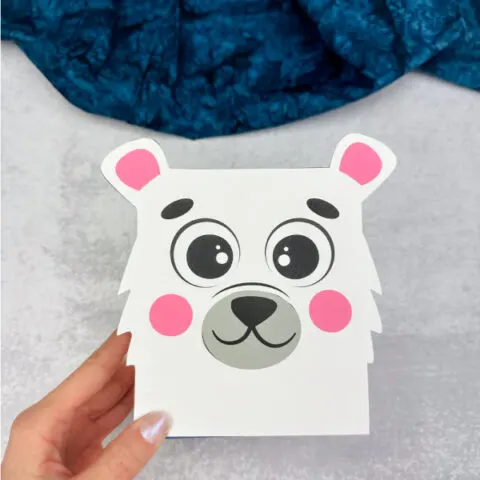 holding the polar bear tissue craft box