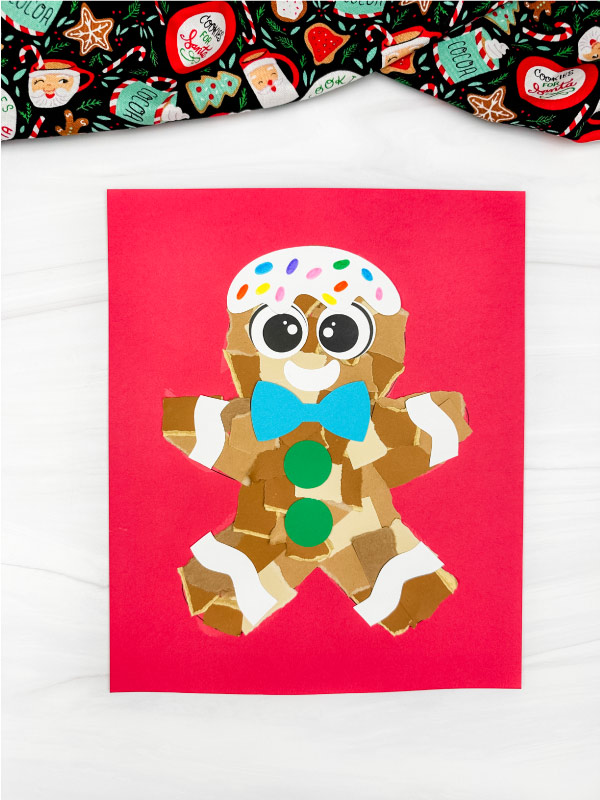 torn paper gingerbread craft solo image red background