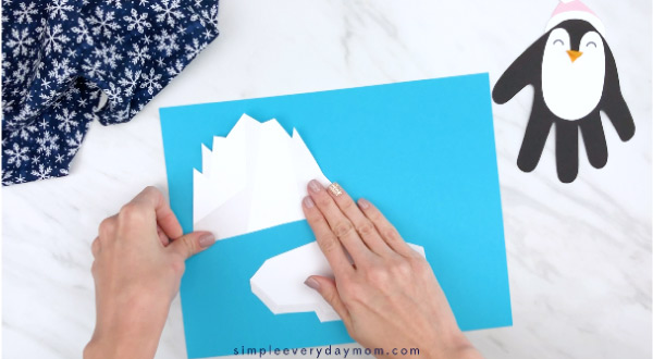 hand gluing the iceberg of the penguin craft
