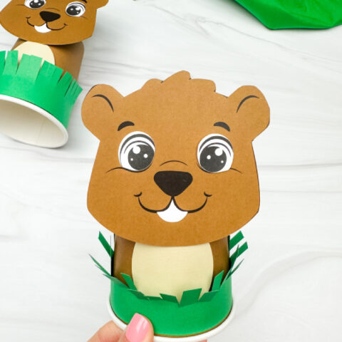 holding the groundhog cup craft