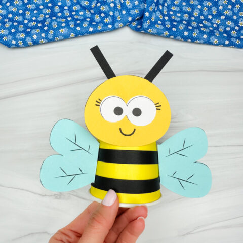 holding the honey bee paper cup craft