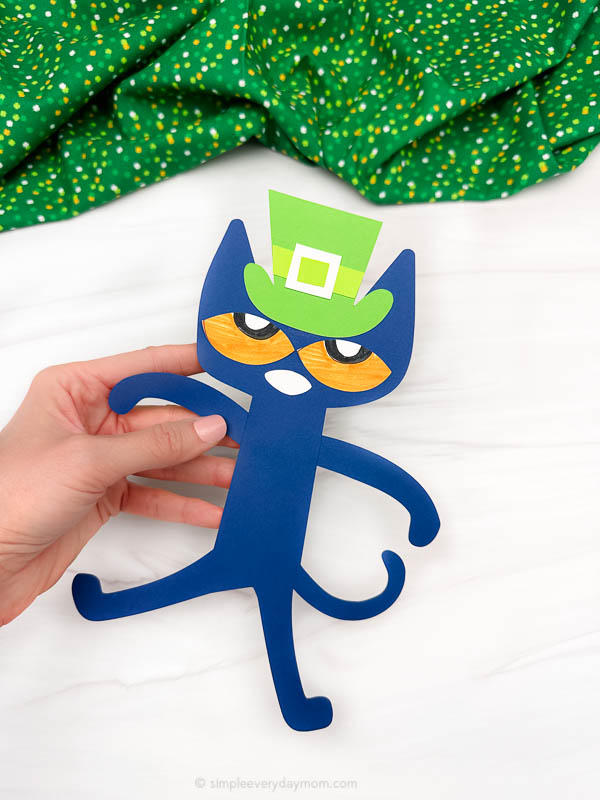 hand holding the pete the cat craft