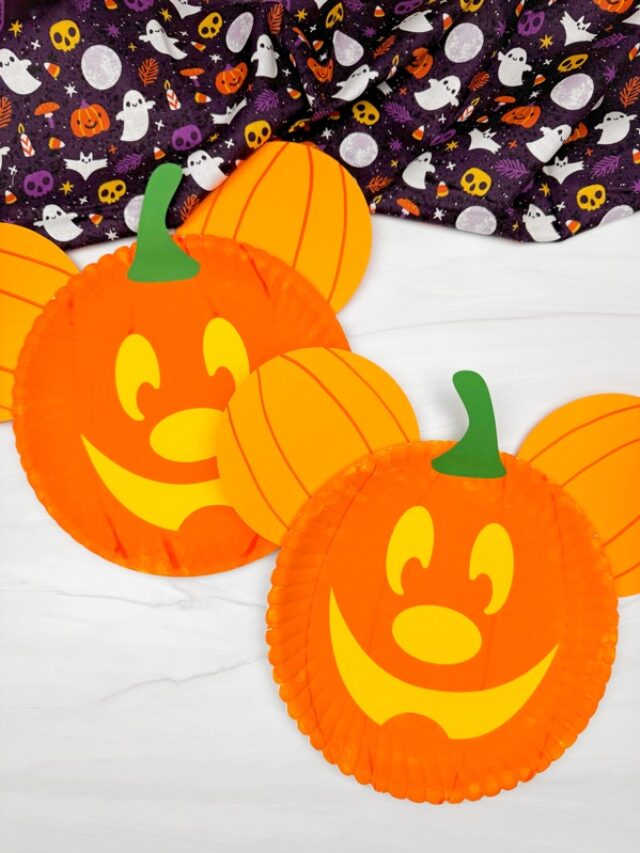Two finished example of the Mickey Mouse Paper Plate Halloween Craft