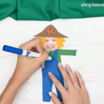 Hand drawing the pocket of the Scarecrow Photo Craft