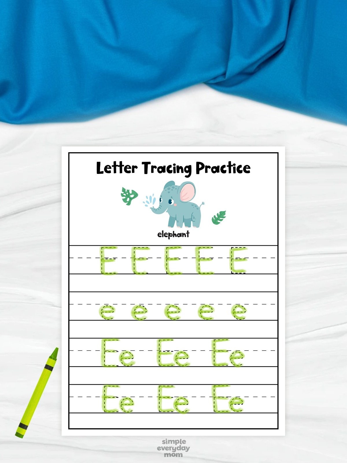 This image shows a printable “Letter Tracing Practice” worksheet designed to help preschool children learn and practice writing the letter “E.” The worksheet features uppercase and lowercase dotted letters for tracing along with a cute cartoon elephant illustration and the word “elephant” at the top. A bright green crayon and soft blue background create a fun, engaging, and child-friendly learning activity focused on early handwriting skills.