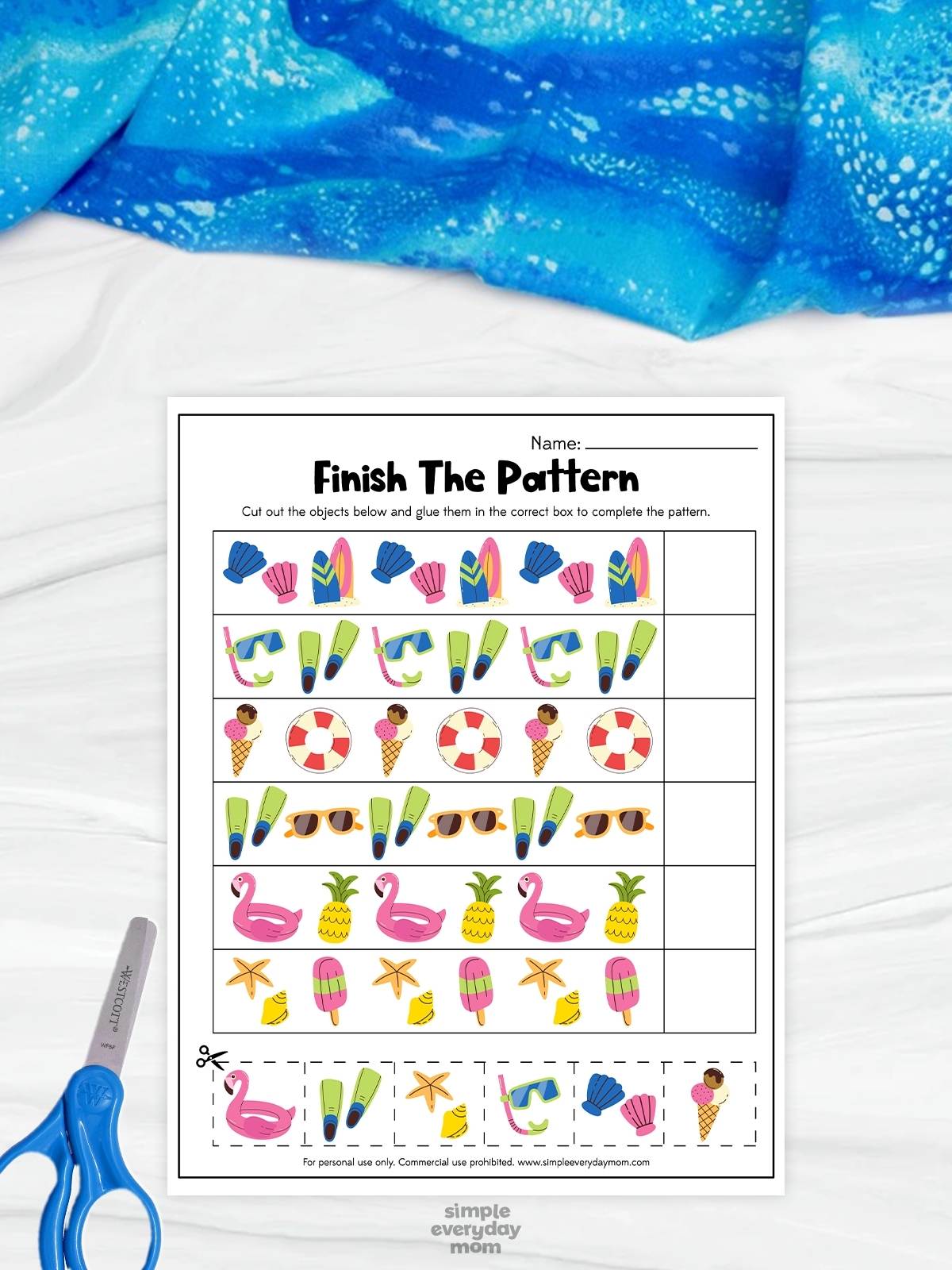 This image shows a printable “Finish The Pattern” worksheet designed to help young children practice pattern recognition and sequencing skills. The activity features colorful summer-themed objects such as seashells, surfboards, snorkels, ice cream cones, flamingos, pineapples, and popsicles arranged in repeating patterns with blank spaces to complete. A pair of blue scissors and cut-out pieces at the bottom add a hands-on interactive element, making the worksheet fun and engaging for preschool and kindergarten learners.