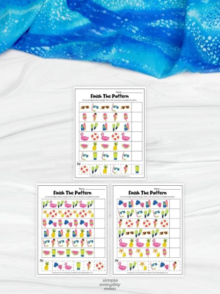 This image shows three printable “Finish The Pattern” worksheets designed to help children practice identifying and completing repeating patterns. The worksheets feature colorful summer-themed pictures such as flamingos, popsicles, pineapples, surfboards, seashells, sunglasses, and beach items arranged in sequences with blank spaces for answers. A bright blue fabric background and cut-and-paste activity pieces give the educational printables a fun, interactive, and kid-friendly appearance for preschool and kindergarten learners.