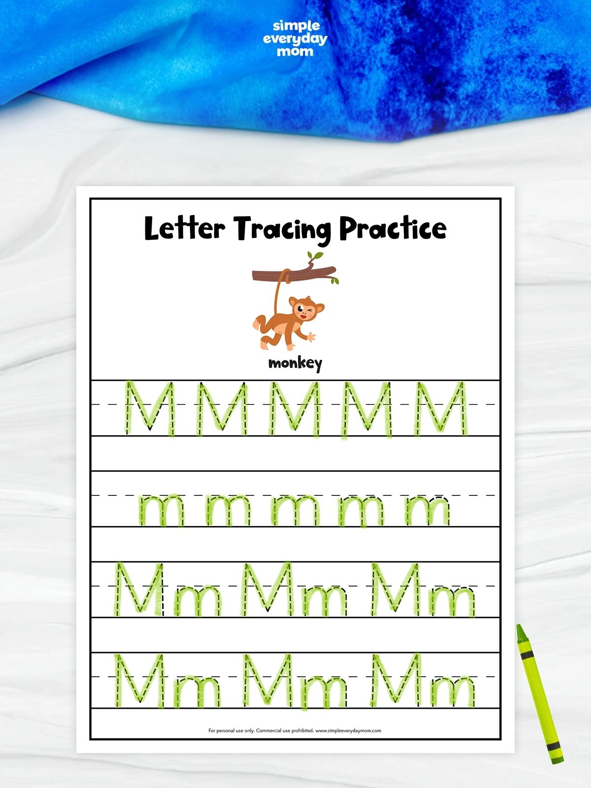 Printable letter tracing worksheet for the letter M, featuring a monkey illustration and rows of uppercase and lowercase M’s to practice tracing.