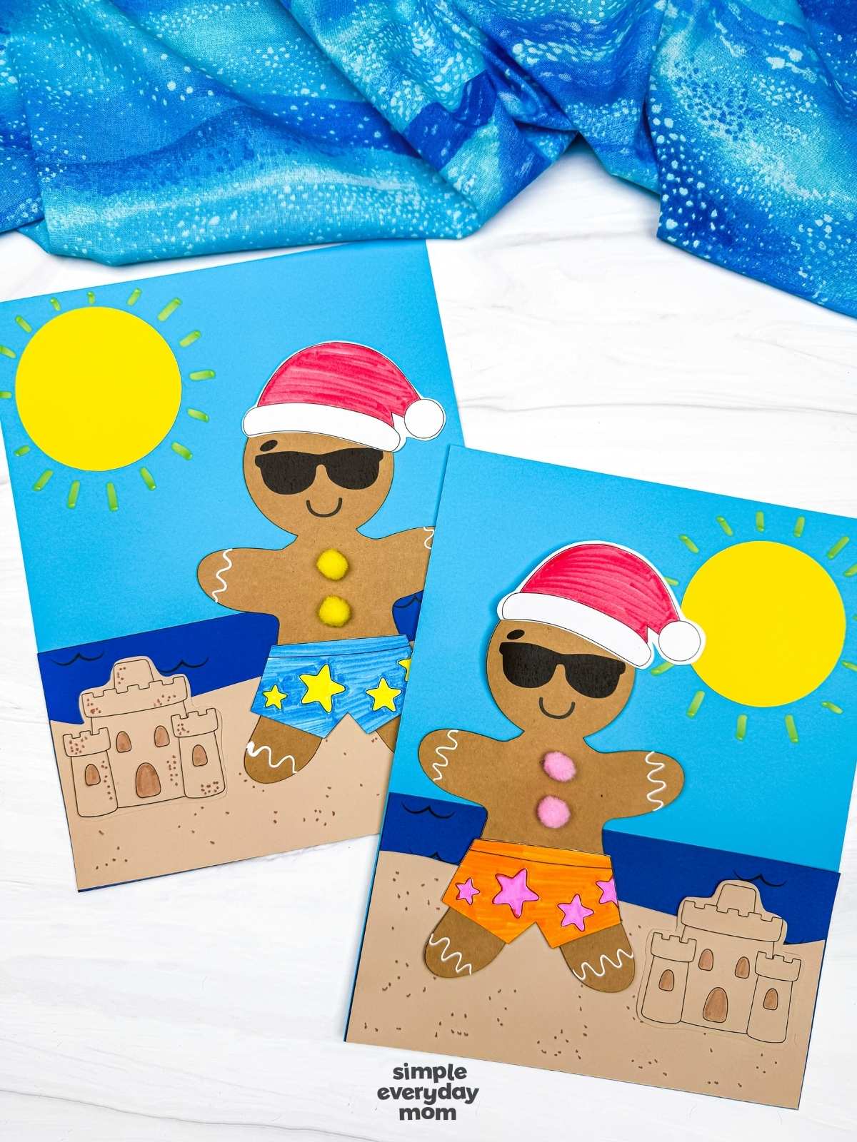 A completed Craft featuring two Christmas in July gingerbread beach scenes with sunglasses-wearing gingerbread characters, Santa hats, colorful swim shorts, sandcastles, and bright yellow suns.