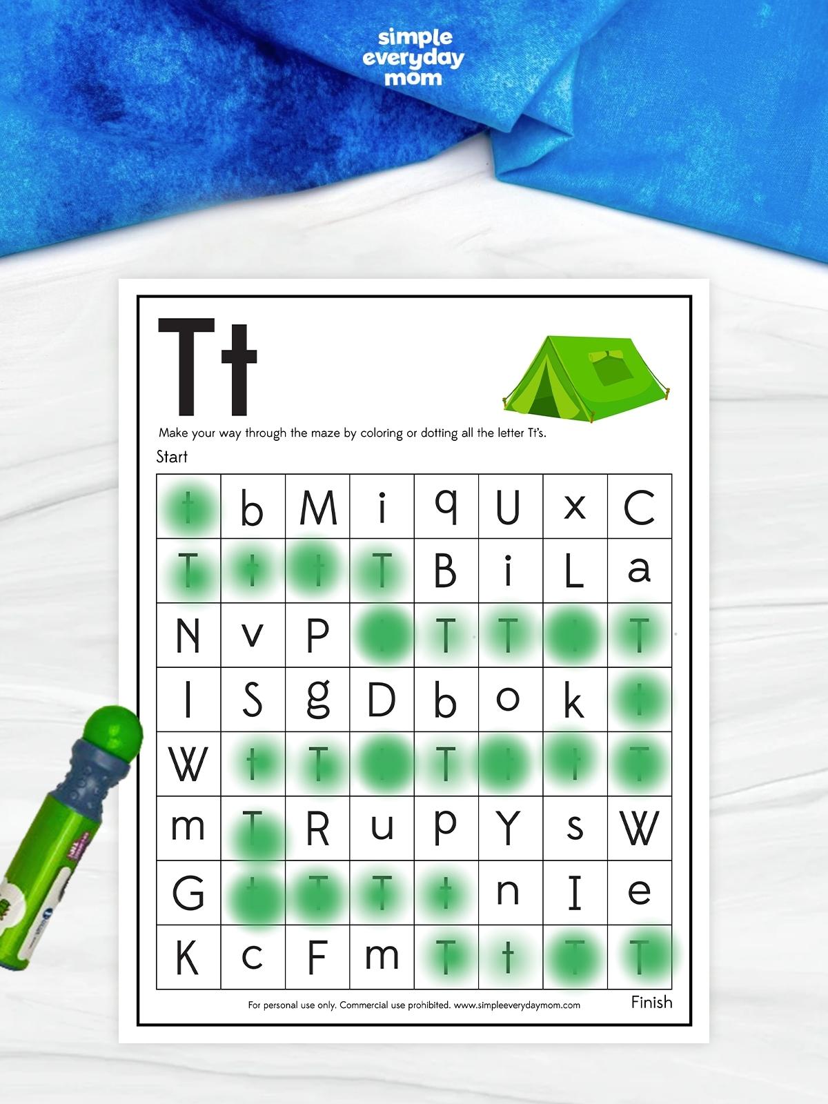 This camping letter T maze worksheet helps preschool and kindergarten kids practice recognizing uppercase and lowercase T in a fun, hands-on way. Children color or dot each letter T to complete the maze while strengthening letter recognition, visual discrimination, and fine motor skills. It's a great printable for classrooms, homeschool, literacy centers, or camping-themed learning.