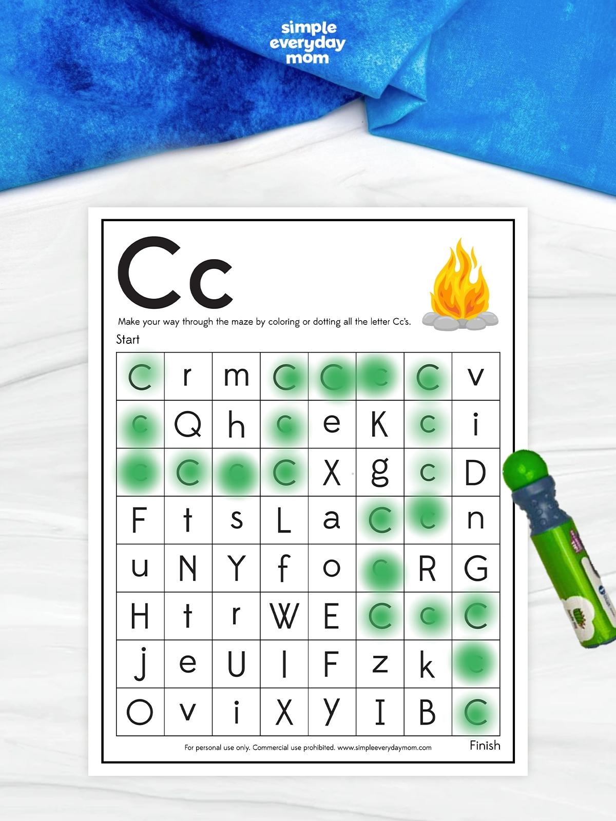 This camping letter C maze worksheet helps preschool and kindergarten kids practice recognizing uppercase and lowercase C in a fun, hands-on way. Children color or dot each letter C to complete the maze while strengthening letter recognition, visual discrimination, and fine motor skills. It's a great printable for classrooms, homeschool, literacy centers, or camping-themed learning.